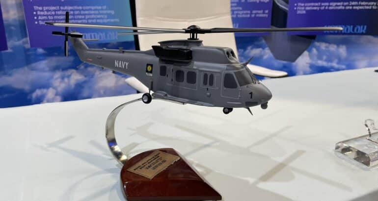 A scale model of a KAI Marineon helicopter in Royal Malaysian Navy colors at Kemalak Group's booth at Defence Services Asia 2024 (Albert Lee)